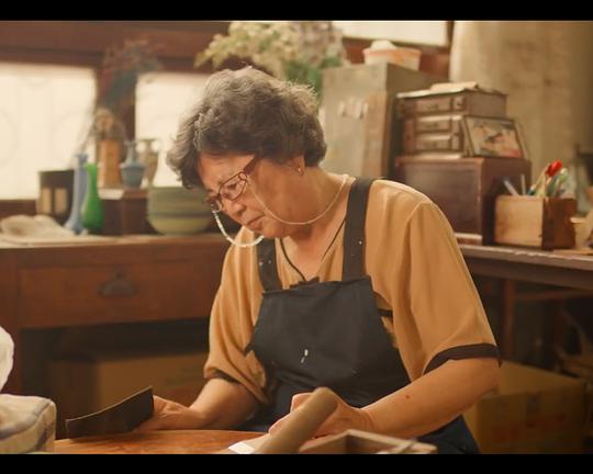 《古物商行》电影封面