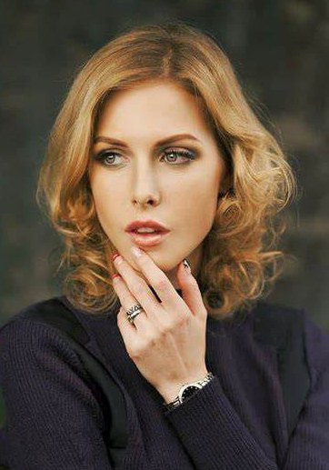 奥克撒娜·斯特蕾佐娃 Oksana Streltsova照片