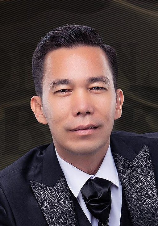 穆明江·阿不力克木 Mominjan Ablikim照片