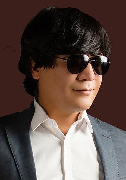 穆太力普·卡伍力 Mutallipjan Kawul照片