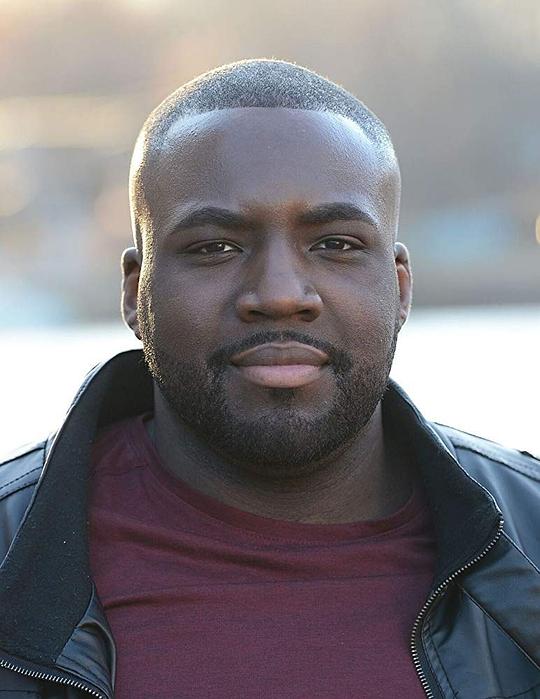 阿德里安·M·蒙波因特 Adrian M. Mompoint照片