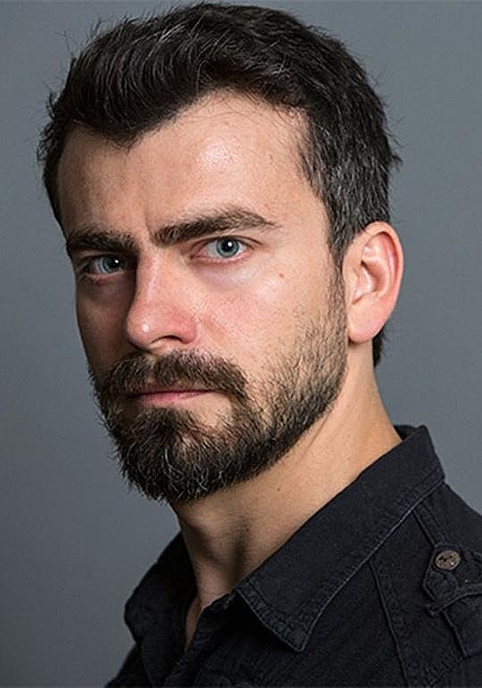 托尔加·伊斯基特 Tolga Iskit照片