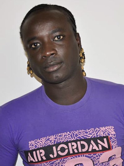 穆穆尼·萨努 Moumouni Sanou照片